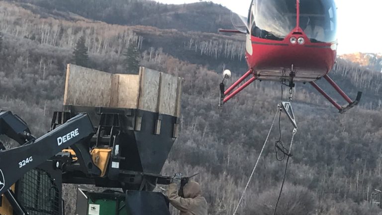 Crews from the DWR begin reseeding in Parleys Canyon. The process will help repair damage from a fire in August that burned 600 acres.