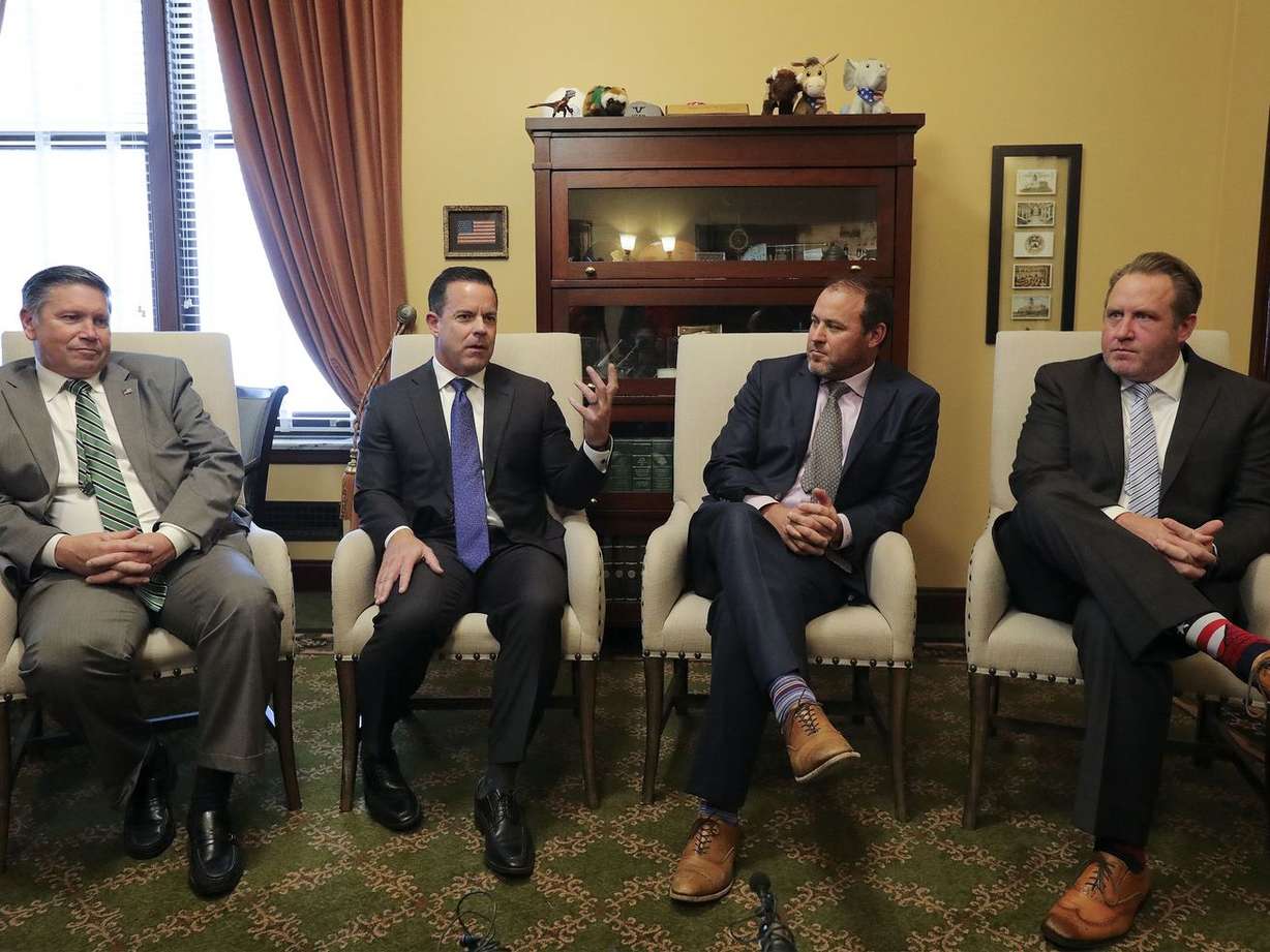 House Majority Assistant Whip Val Peterson, R-Orem, left, House Speaker Brad Wilson, R-Kaysville, newly elected House Majority Leader Mike Schultz, R-Hooper, and newly elected House
Majority Whip Jefferson Moss, R-Saratoga Springs, talk to members
of the media in Wilson’s office before a special legislative
session at the Capitol in Salt Lake City on Tuesday.