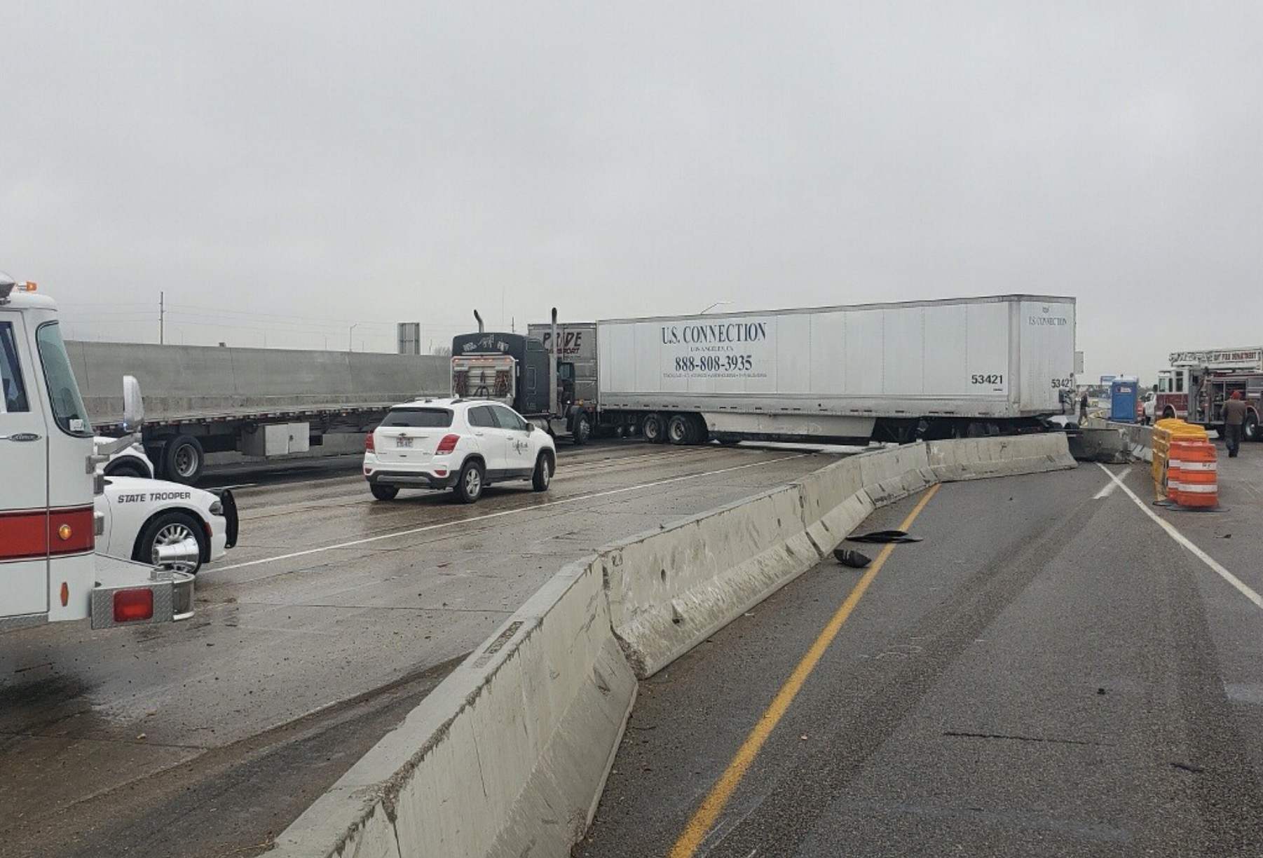 Semitrucks block southbound I-15 near Roy on Tuesday. 