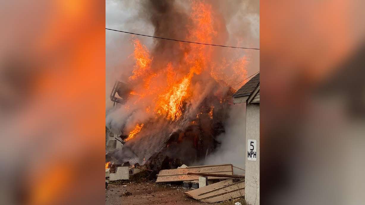 Firefighters respond to large structure fire in Springville on Tuesday.