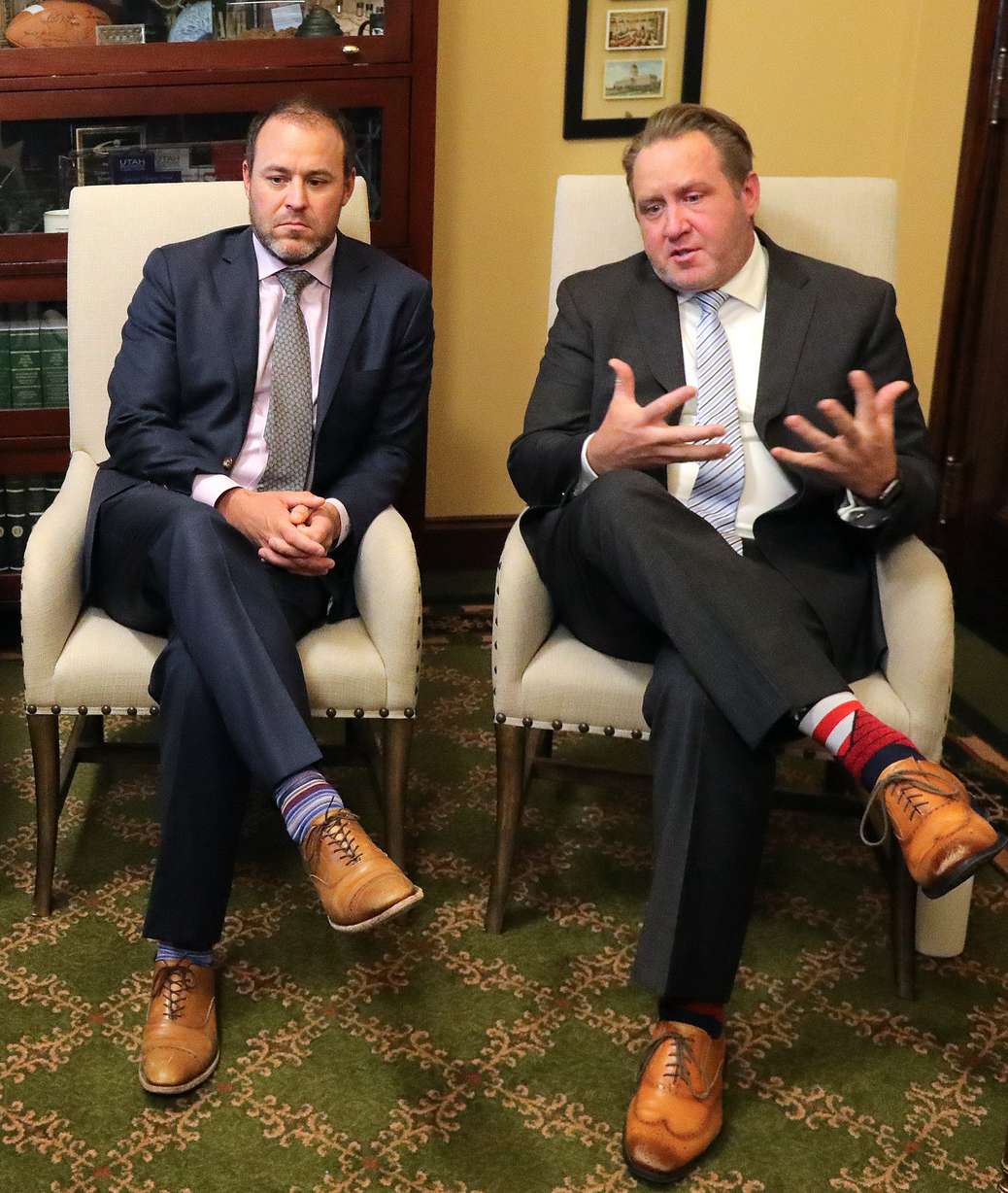 Newly elected House Majority Leader Mike Schultz, R-Hooper, and newly elected House Majority Whip Jefferson Moss, R-Saratoga Springs, talk to members of the media in the House speaker's office before a special legislative session at the Capitol in Salt Lake City on Tuesday.