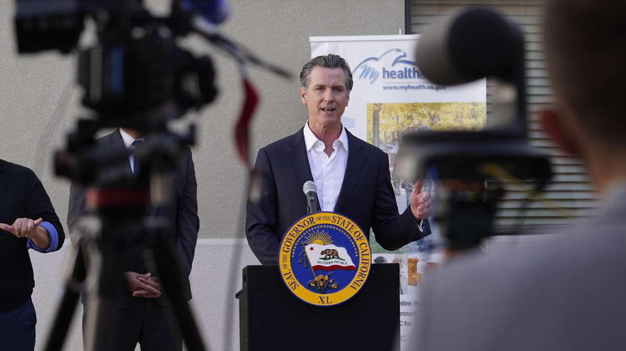 California Gov. Gavin Newsom takes questions from the media after a visit to a COVID-19 vaccine clinic at the VA Greater Los Angeles Healthcare System to promote vaccinations and booster shots in Los Angeles on Nov. 10.