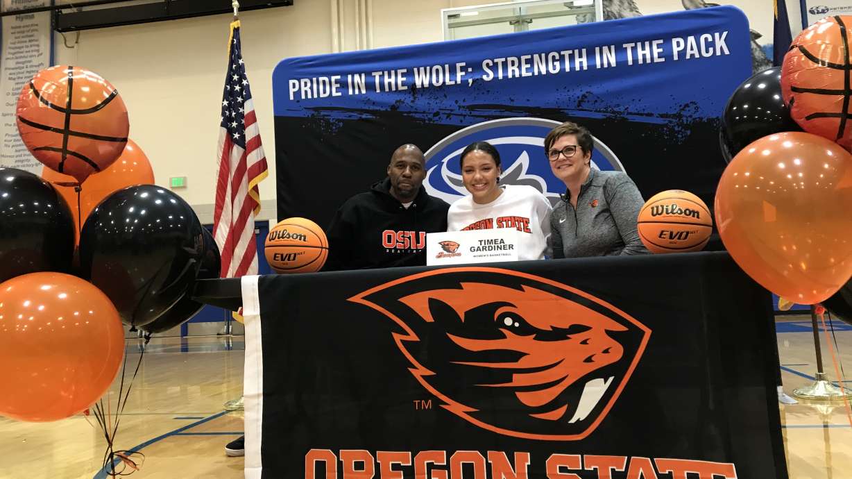 Fremont forward Timea Gardiner with her family after signing with Oregon State, Tuesday, Nov. 10, 2021, the first day of the NCAA's early signing period.