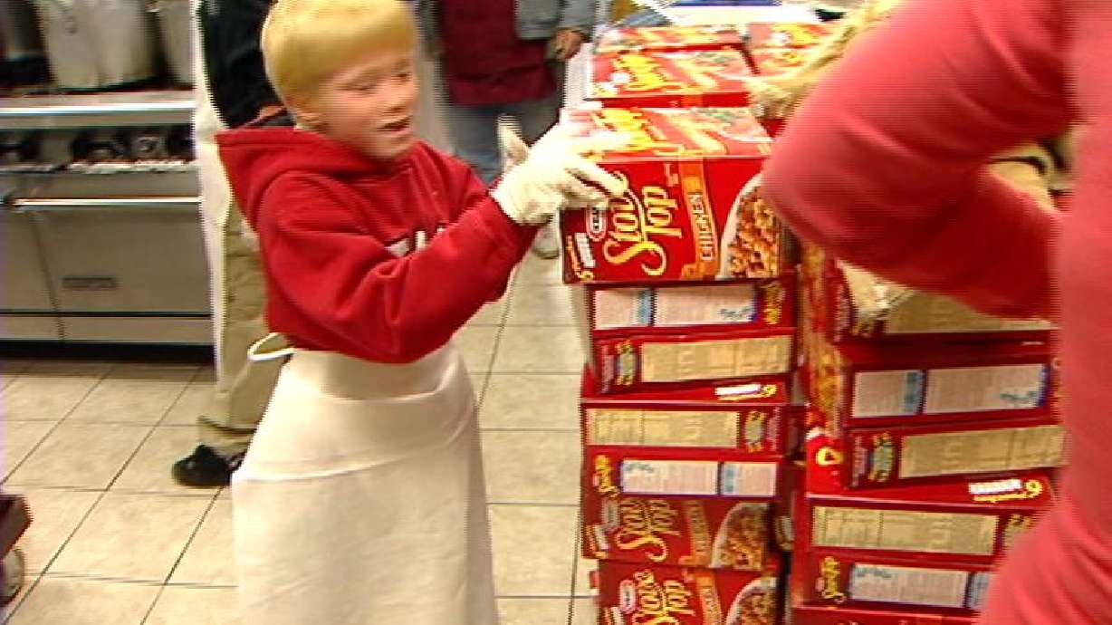 Volunteers Dish Out Holiday Meals for Less Fortunate