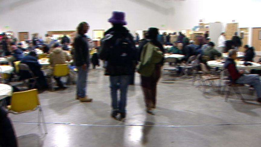 Volunteers Dish Out Holiday Meals for Less Fortunate
