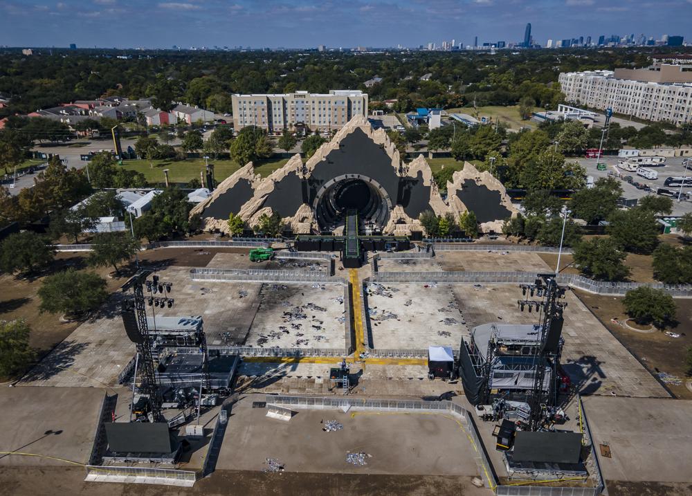 The Astroworld main stage where Travis Scott was performing Friday evening where a surging crowd killed nine people, sits full of debris from the concert, in a parking lot at NRG Center on Monday, in Houston.