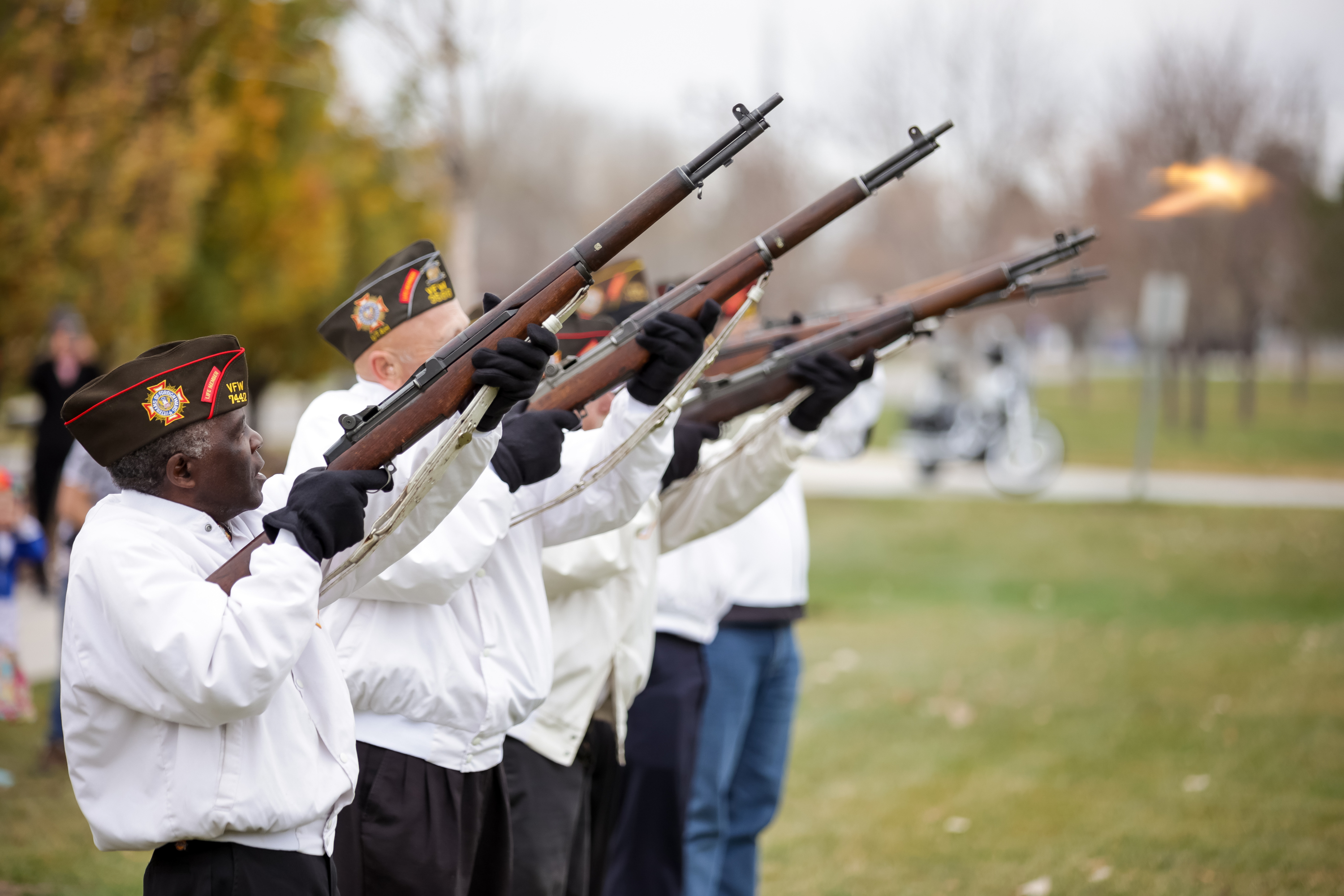 James Shepphard, commander of Veterans of Foreign Wars Post 7442 and an Army veteran, leads an honor guard in a rifle salute during a Veterans Day ceremony, at Veterans Memorial Park in West Jordan, on Thursday.