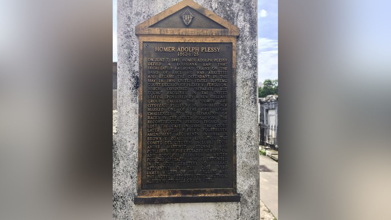 A marker on the burial site for Homer Plessy at St. Louis No. 1 Cemetery in New Orleans June 3, 2018. A Louisiana board on Friday posthumously pardoned Plessy.