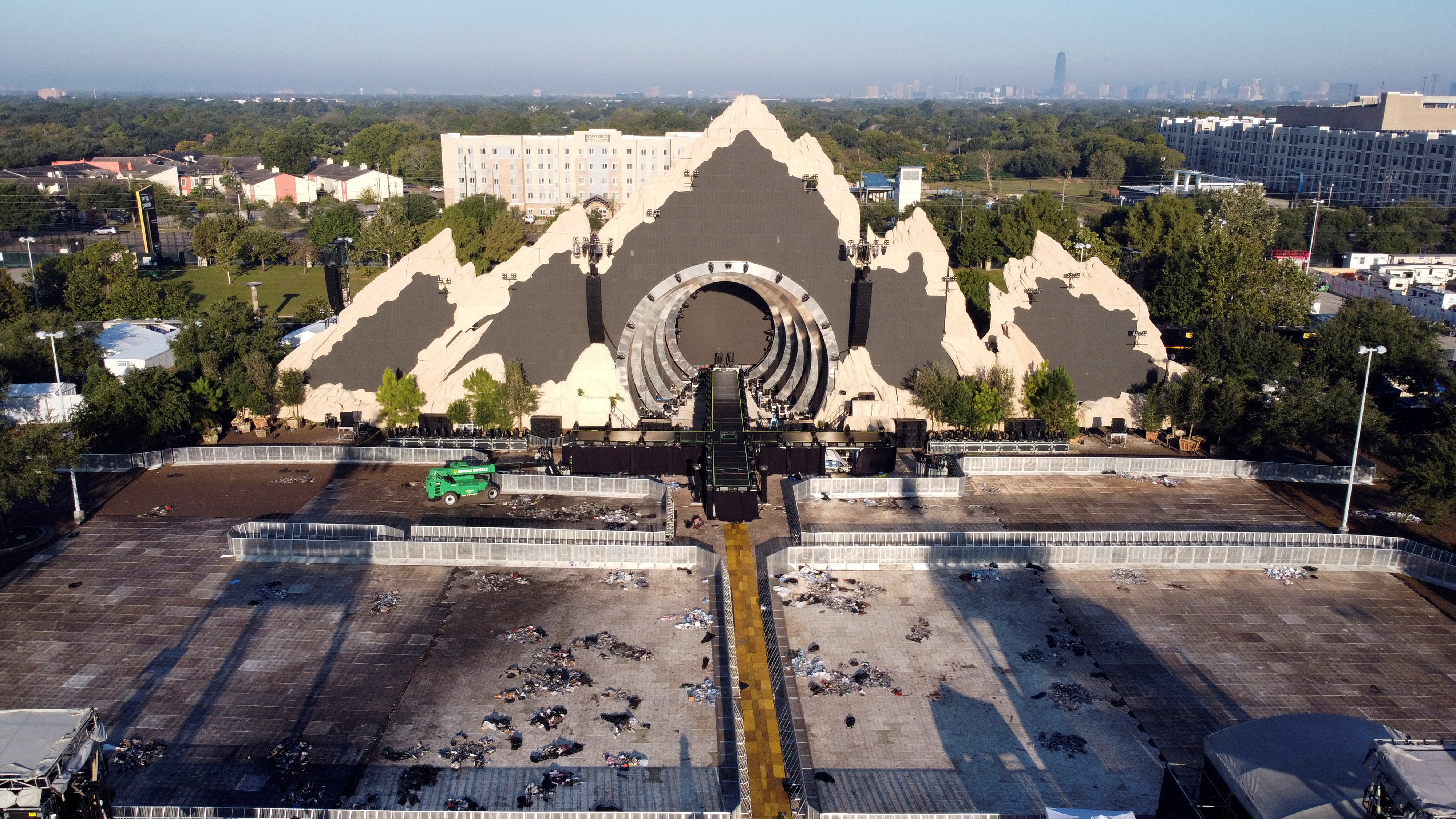 An empty stage is seen at the 2021 Astroworld Festival days after a stampede killed at least nine people in Houston, Texas, Sunday. Attorneys representing more than 200 people claiming they were injured in last week's Astroworld Festival stampede in Houston said on Friday that they are filing another 90 lawsuits against the promoters of the event in which at least nine people died.