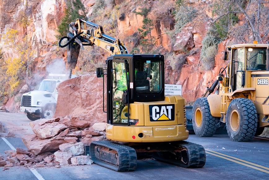 Crews work to clear debris from a rockfall inside Zion National Park Friday. No injuries or vehicle damage was reported as a result of the rockfall.