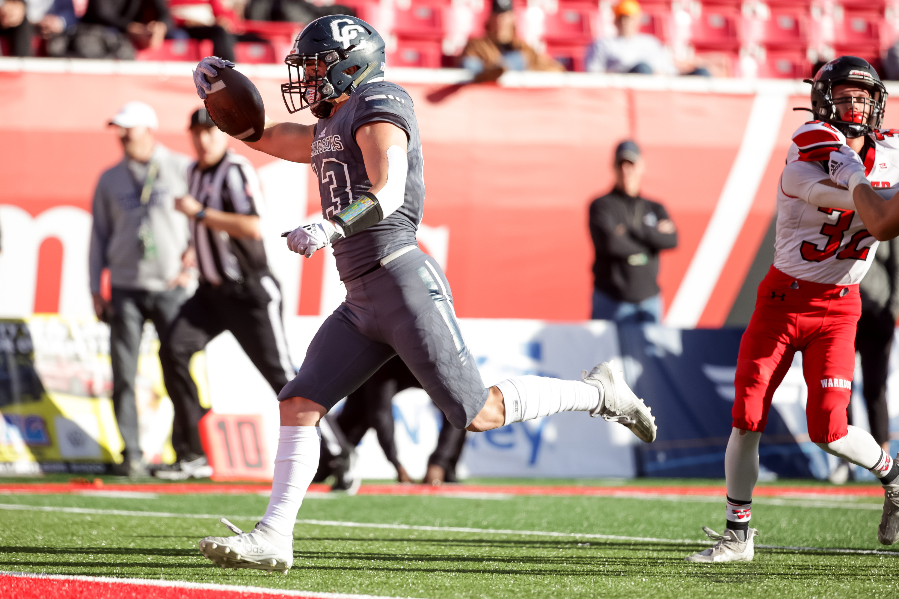 Corner Canyon’s Drew Patterson runs in for a touchdown in a 6A football state semifinal game against Weber at Rice-Eccles Stadium in Salt Lake City on Friday, Nov. 12, 2021.