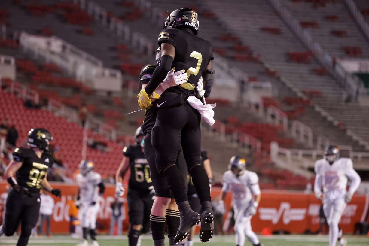 Lone Peak’s Luke Hyde celebrates a touchdown in a 6A football semifinal game against Skyridge at Rice-Eccles Stadium in Salt Lake City on Friday, Nov. 12, 2021.