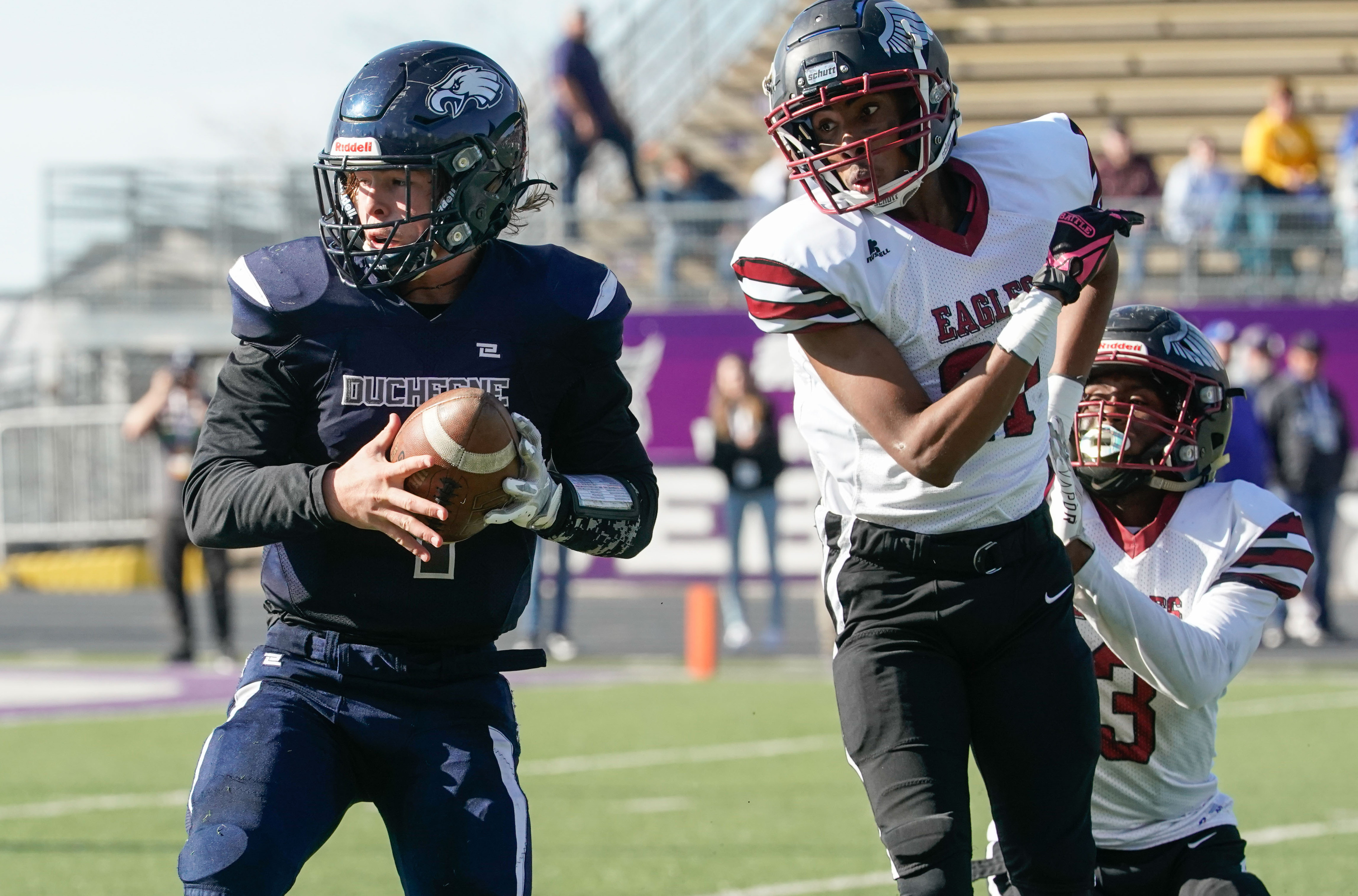 Duchesne’s Draker Goodliffe, left, receives the ball for a touchdown against Layton Christian in the 1A football championship game on Saturday, Nov. 13, 2021 at Stewart Stadium in Ogden.