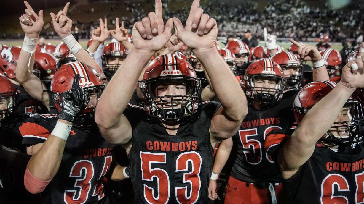 Grantsville high players celebrate their win against Morgan in the 3A football championship game on Saturday, Nov. 13, 2021 at Stewart Stadium in Ogden.