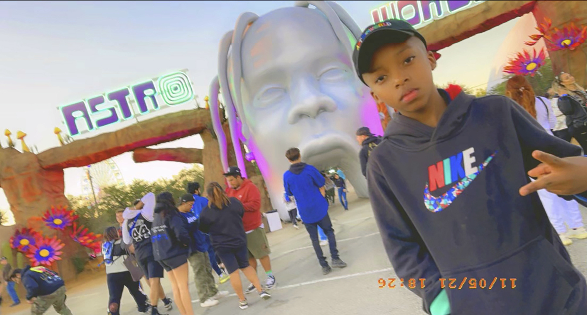 This photo provided by Taylor Blount shows Ezra Blount, 9, posing outside the Astroworld music festival in Houston on Nov. 5. Ezra has become the youngest person to die from injuries sustained during a crowd surge at the Astroworld music festival. Ezra, of Dallas, died Sunday at Texas Children’s Hospital in Houston, family attorney Ben Crump said. 