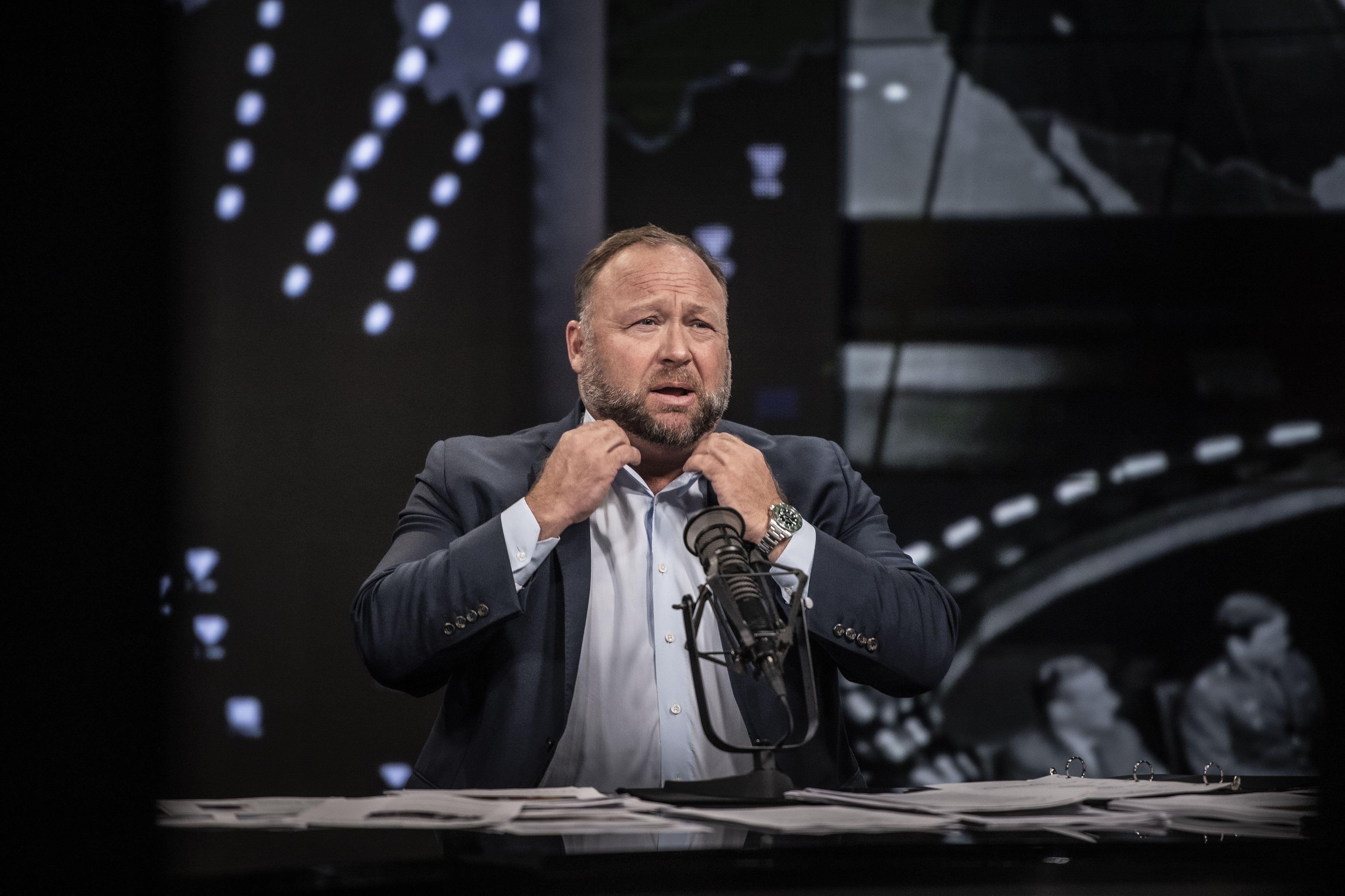 Alex Jones hosts The Alex Jones Show from Austin, Texas, Oct. 20, 2020. Infowars host and conspiracy theorist Alex Jones was found liable Monday for damages in lawsuits brought by parents of children killed in the Sandy Hook Elementary School shooting over Jones’ claims that the massacre was a hoax.