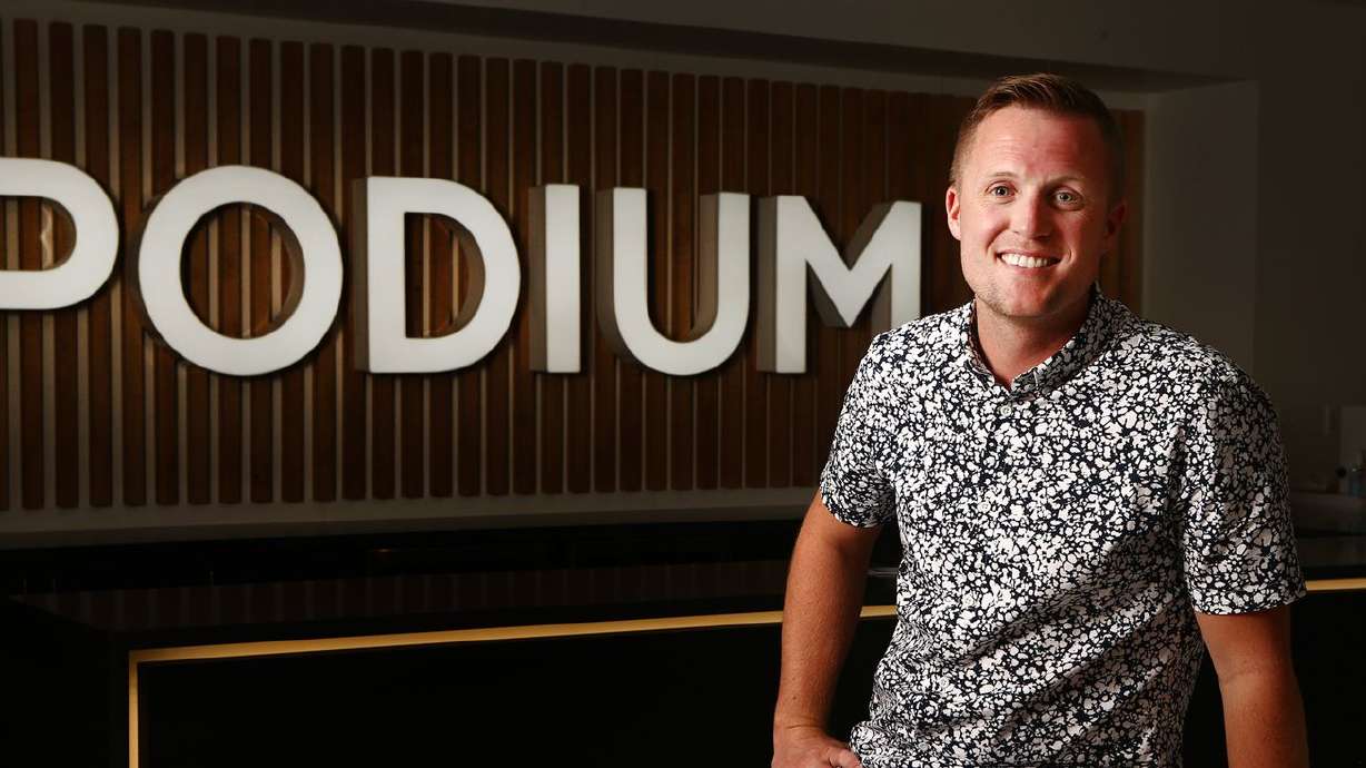 Podium CEO Eric Rea poses for a photo in the company’s front lobby in Lehi on June 26, 2017. Utah customer communications and payments platform Podium hit another benchmark Monday, announcing a fresh $201 million funding round and market valuation north of $3 billion.