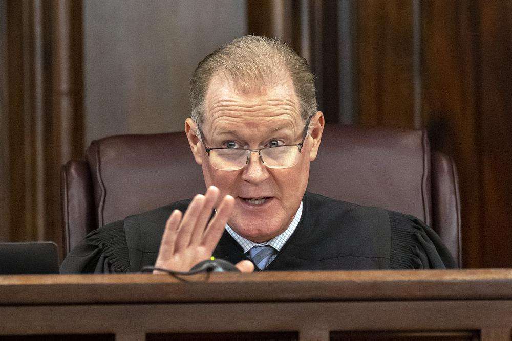 Superior Court Judge Timothy Walmsley addresses an objection by the defense during the trial of Greg McMichael and his son, Travis McMichael, and a neighbor, William "Roddie" Bryan in the Glynn County Courthouse, Tuesday, Nov. 9, 2021, in Brunswick, Ga. The three are charged with the February 2020 slaying of 25-year-old Ahmaud Arbery.