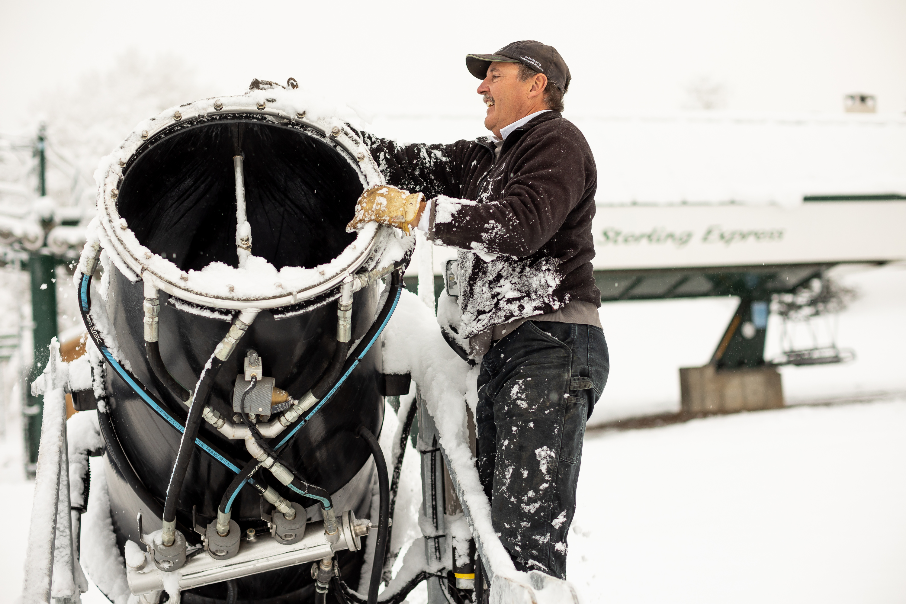 Scott Enos, snowmaking manager at Deer Valley, dusts off a fan gun used to make snow at the resort in Park City on Oct. 19.