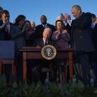 Sen. Mitt Romney joins President Joe Biden for bipartisan infrastructure bill signing