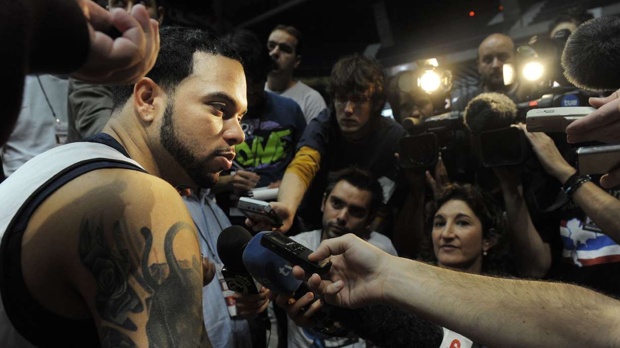 Deron Williams of Utah Jazz answers questions from journalists after a training session at the Palacio de los Deportes, in Madrid, Wednesday, Oct. 7, 2009. The Utah Jazz will be looking to get the NBA back on level terms against Spanish opposition when they face Real Madrid in a preseason game on Thursday.
