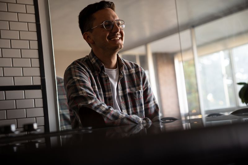 Leo Masic poses for a photo in his condo in Salt Lake
City on Friday, Oct. 22, 2021.