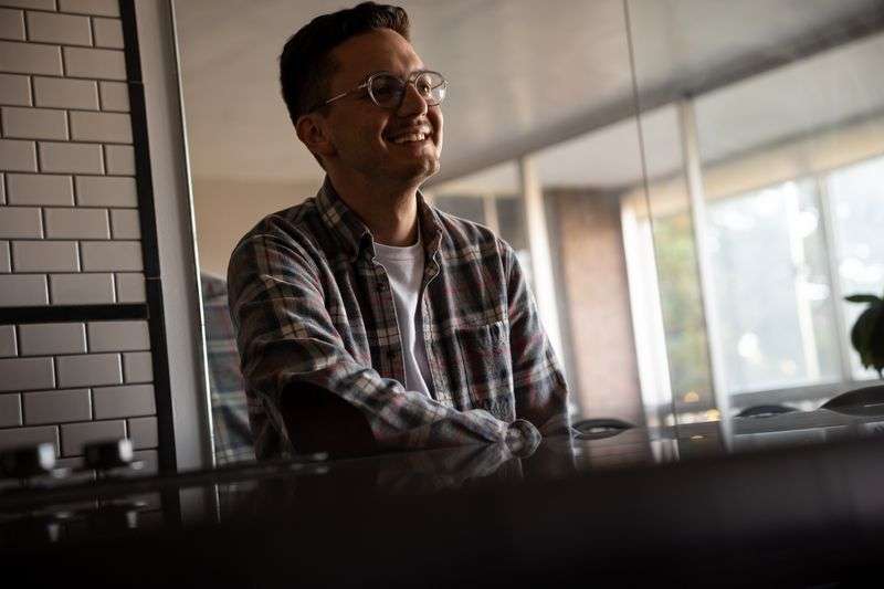 Leo Masic poses for a photo in his condo in Salt Lake
City on Friday, Oct. 22, 2021.