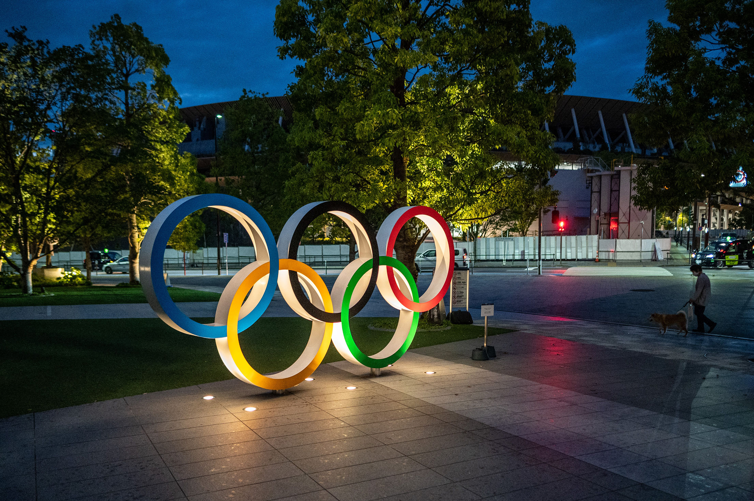 The Olympic rings are seen lit outside the Japan Olympic Museum in Tokyo on May 17. The International Olympic Committee has announced new framework on transgender athletes, saying that no athlete should be excluded from competition on the assumption of an advantage due to their gender. 