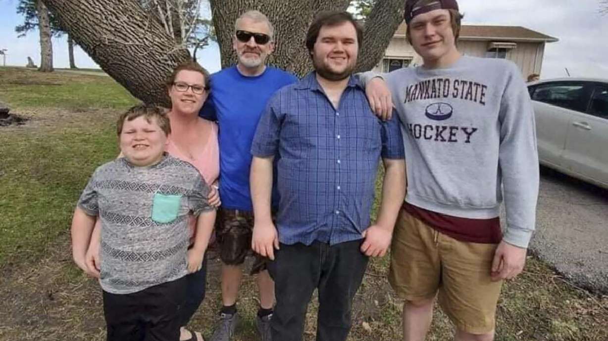 This photo provided by Nancy Sack shows Carter Lange, Kim Gustavson, Jason Lange, Matthew Gustavson and Travis Gustavson. Nancy Sack's grandson, Travis Gustavson, died at age 21 in Mankato after overdosing on what he thought was heroin but was actually laced with fentanyl.