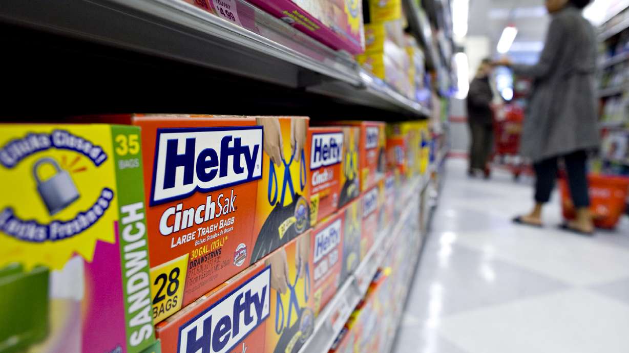 Hefty trash bags sit on display in a supermarket in New York on May 17, 2010. For years, stores' cheaper, in-house labels chipped away at the dominance of classic food and household staple brands. Not anymore.