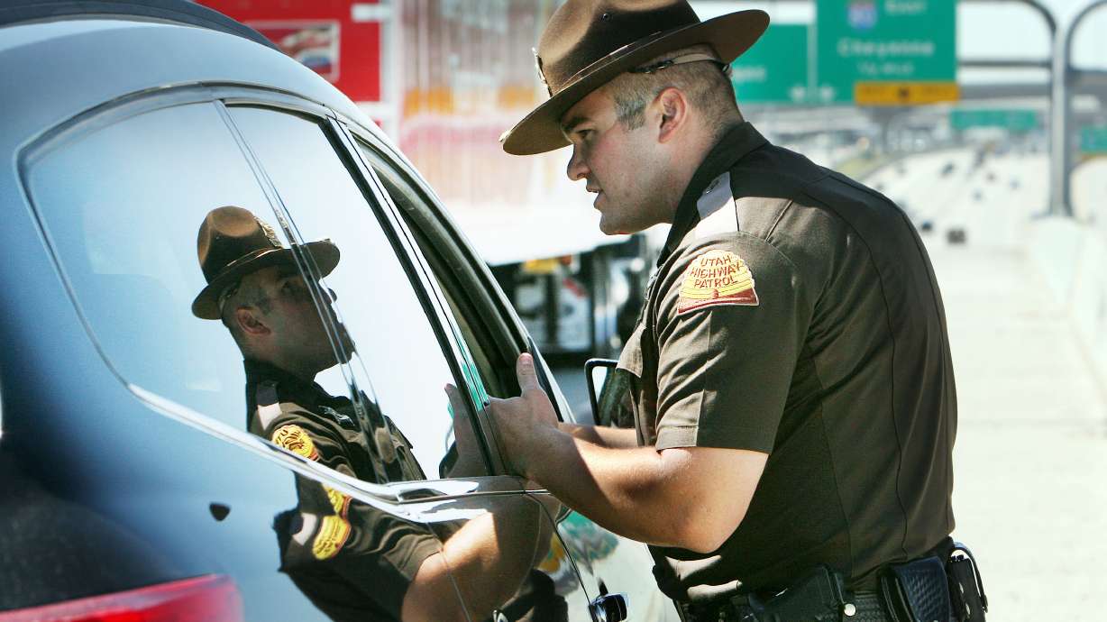 Utah Highway Patrol trooper Mark Bricker makes a stop on I-15 for a seat belt violation on May 21, 2012. Additional troopers will be on the roads during Thanksgiving travel as part of the annual Click It or Ticket campaign.