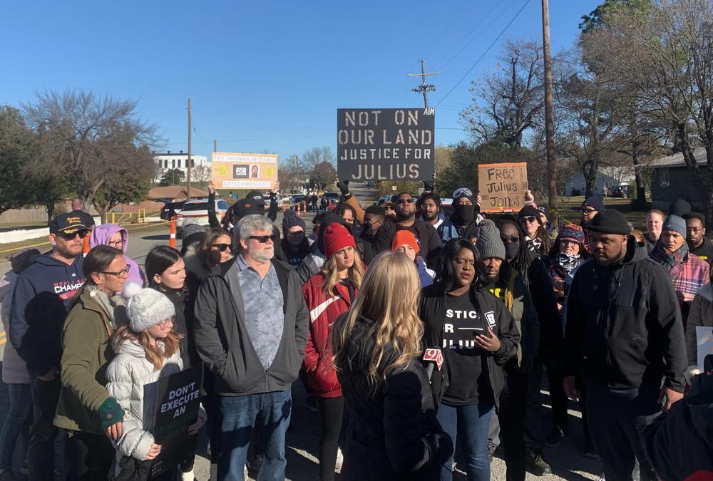 Supporters of Julius Jones rally outside Oklahoma State Penitentiary on Thursday in Norman, Okla. Jones is scheduled to receive the lethal injection in Oklahoma's highest-profile execution in decades. Jones was convicted of murder in the 1999 killing of Paul Howell, a suburban Oklahoma City businessman. The 41-year-old Jones maintains he was framed by the actual killer, a co-defendant who testified against him and was released from prison after 15 years. 