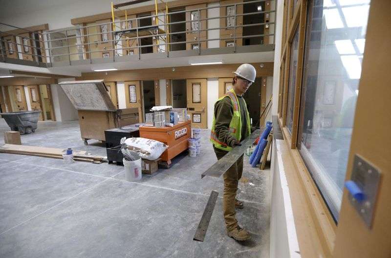 Dallas Tucker, Ezarc Building Solutions laborer, works
in the receiving and orientation building at the new Utah State
Prison in Salt Lake City on Thursday, Oct. 21.