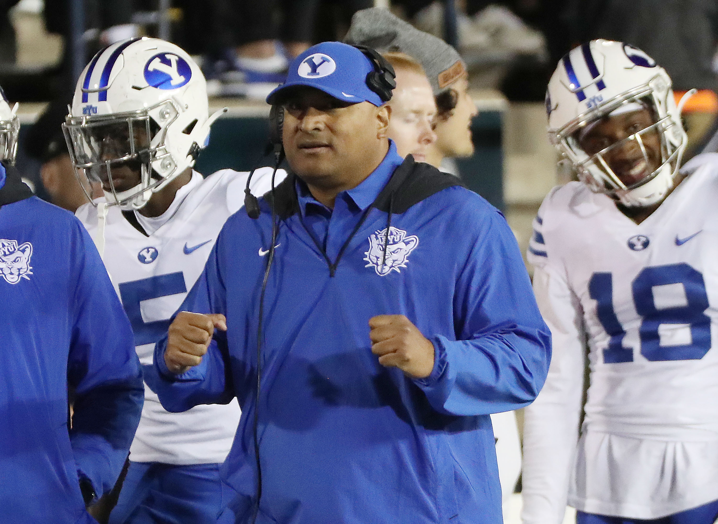 Brigham Young Cougars coach Kalani Sitake celebrates a field goal in a game against the Utah State Aggies in Logan on Friday, Oct. 1.