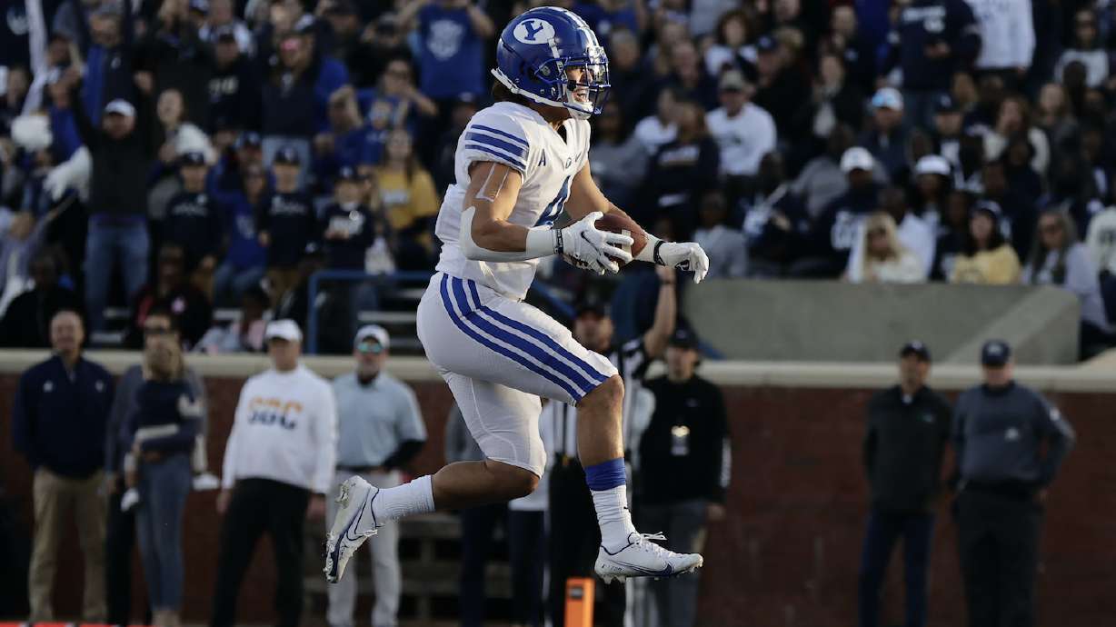 BYU running back Lopini Katoa celebrates a touchdown during the Cougars' road game at Georgia Southern, Saturday, Nov. 20, 2021 in Statesboro, Ga.