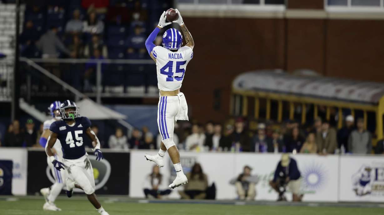 BYU receiver Puka Nacua high points a ball during the Cougars' road game at Georgia Southern, Saturday, Nov. 20, 2021 in Statesboro, Ga.