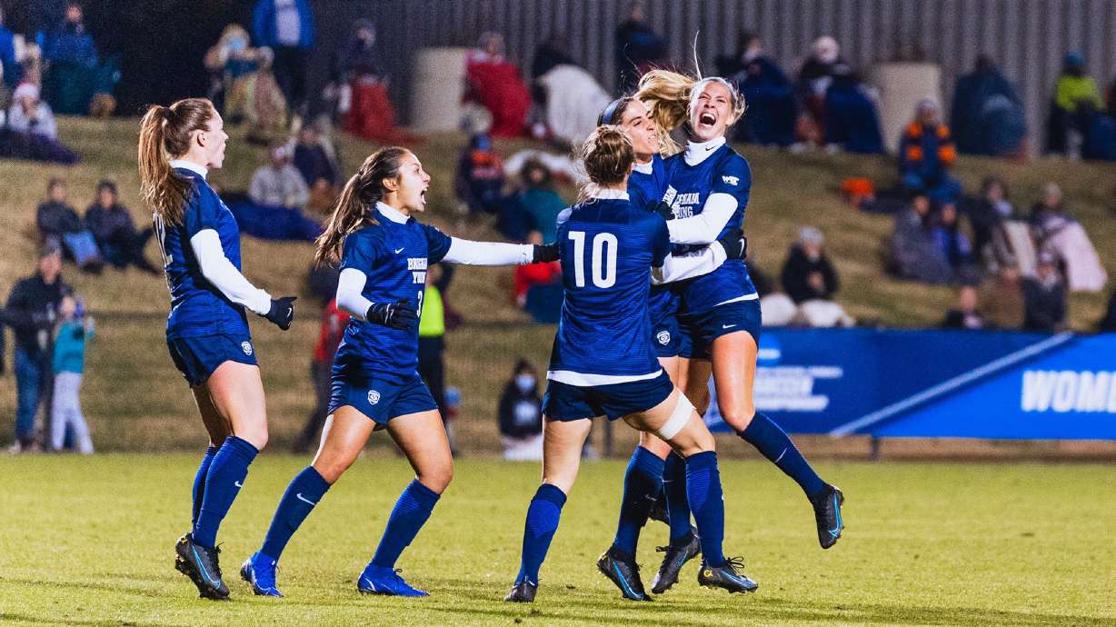 BYU women's soccer celebrates Cameron Tucker's game-winning goal in the 47th minute of a 1-0 win over top-seeded Virginia, Saturday, Nov. 20, 2021 in Charlottesville, Virginia.