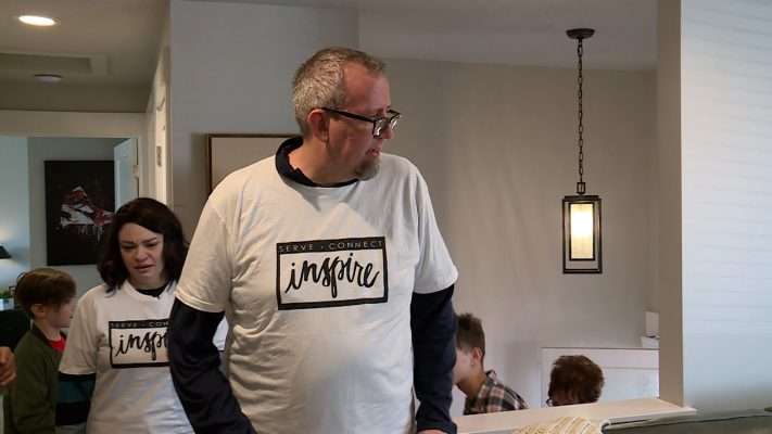 The McDonald family sees their newly renovated home for the first time Saturday in Taylorsville.