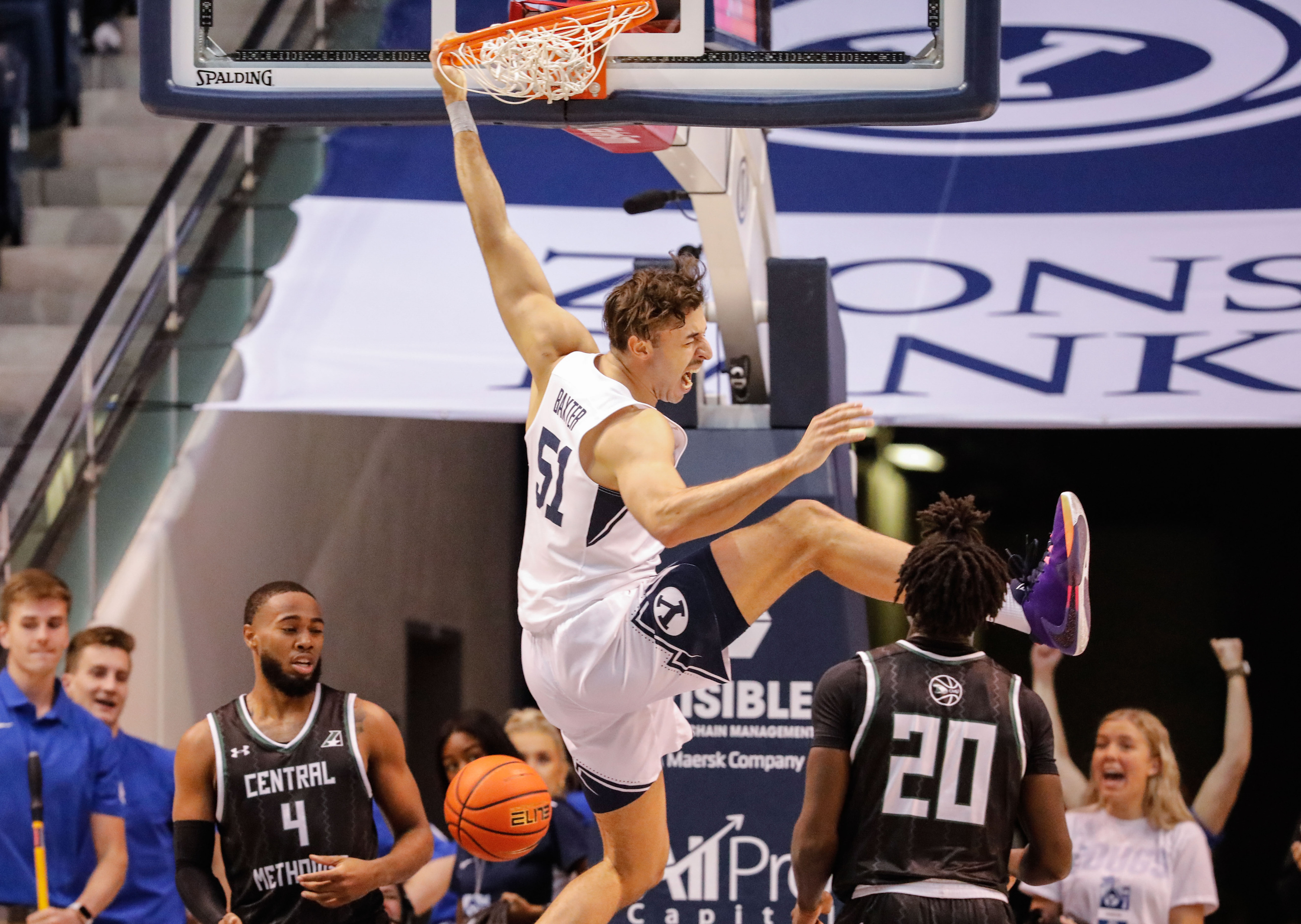 BYU forward Gavin Baxter (51) celebrates after a dunk against Central Methodist during an NCAA game at the Marriott Center in Provo on Saturday, Nov. 20, 2021.