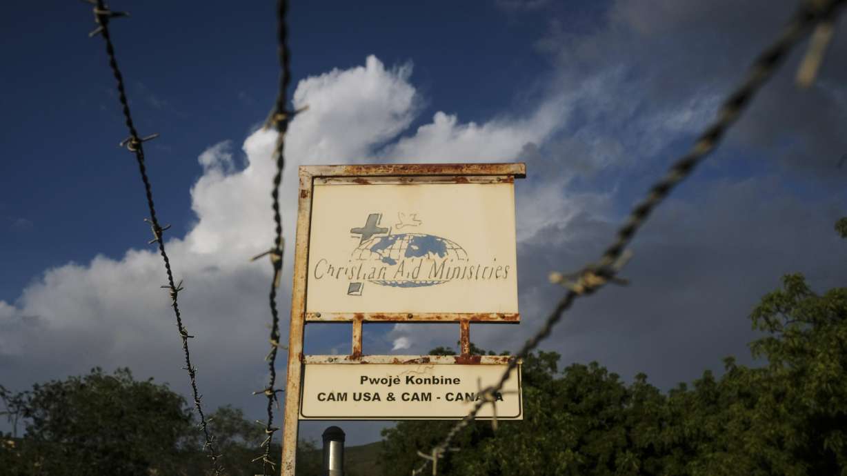 This Oct. 21, photo shows a sign outside Christian Aid Ministries in Titanyen, Haiti, which had 17 of their members kidnapped by the 400 Mawozo gang. Two of 17 abducted members of a missionary group have been freed in Haiti and are safe, “in good spirits and being cared for,” their Ohio-based church organization, Christian Aid Ministries, announced Sunday.
