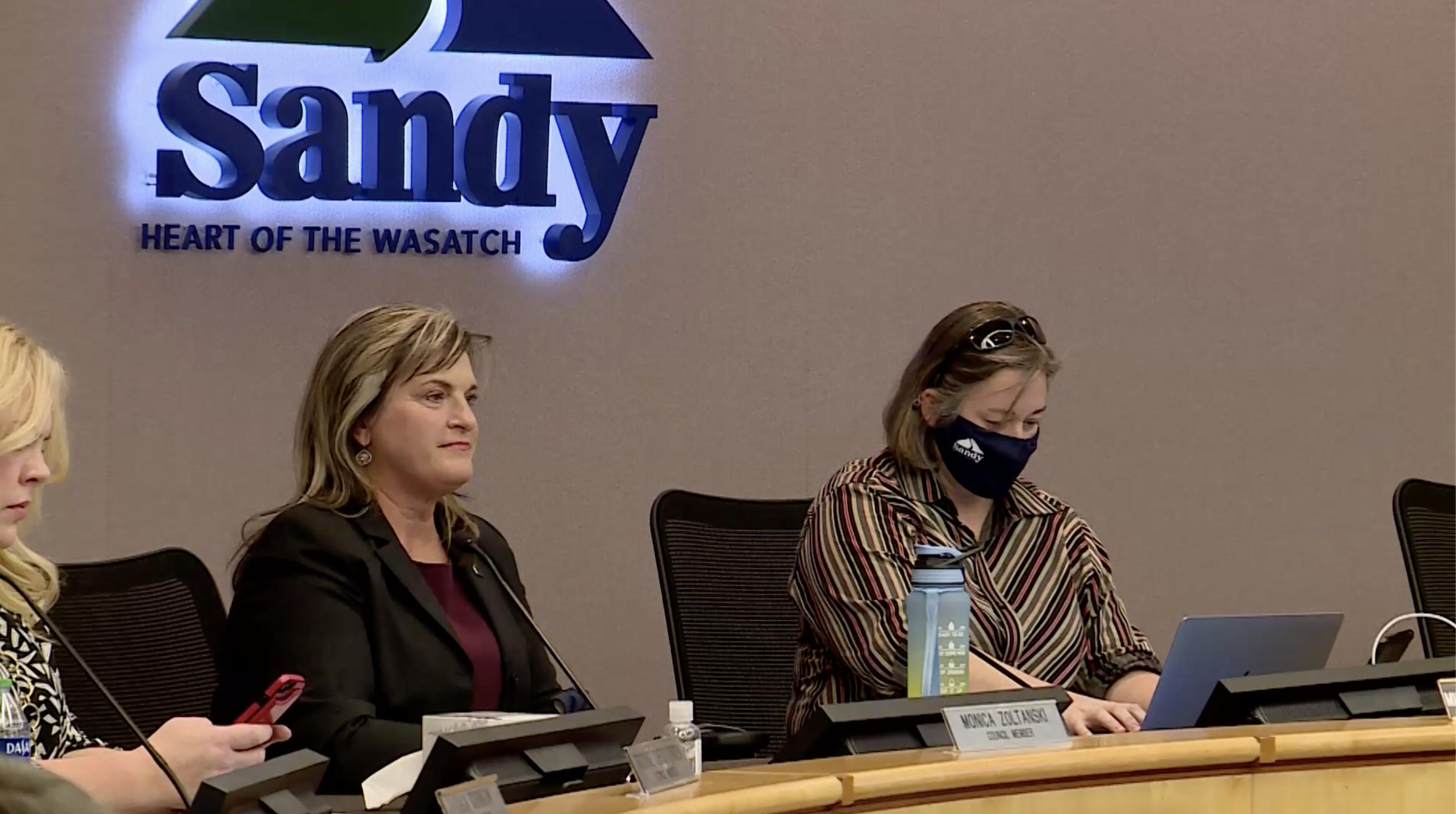 Sandy City Council member Monica Zoltanski, left, listens during a Monday meeting in which council members  finally voted to certify the city's municipal election results. Zoltanski defeated challenger Jim Bennett by just 21 votes in the Nov. 2 election.