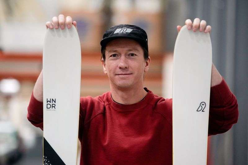 Pep Fujas, professional skier and vice president of
marketing and product development of WNDR Alpine, a local company
that uses algae-based bioplastics to replace plastics used in ski
construction, poses for a portrait at the company’s facility in
Salt Lake City on Friday.