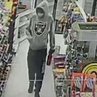 Man sentenced in gun theft tied to murder of Ogden grocer