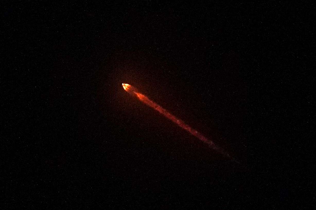 The DART spacecraft, short for Double Asteroid Redirection Test, atop a SpaceX Falcon 9 rocket is seen Tuesday from Simi Valley, Calif.