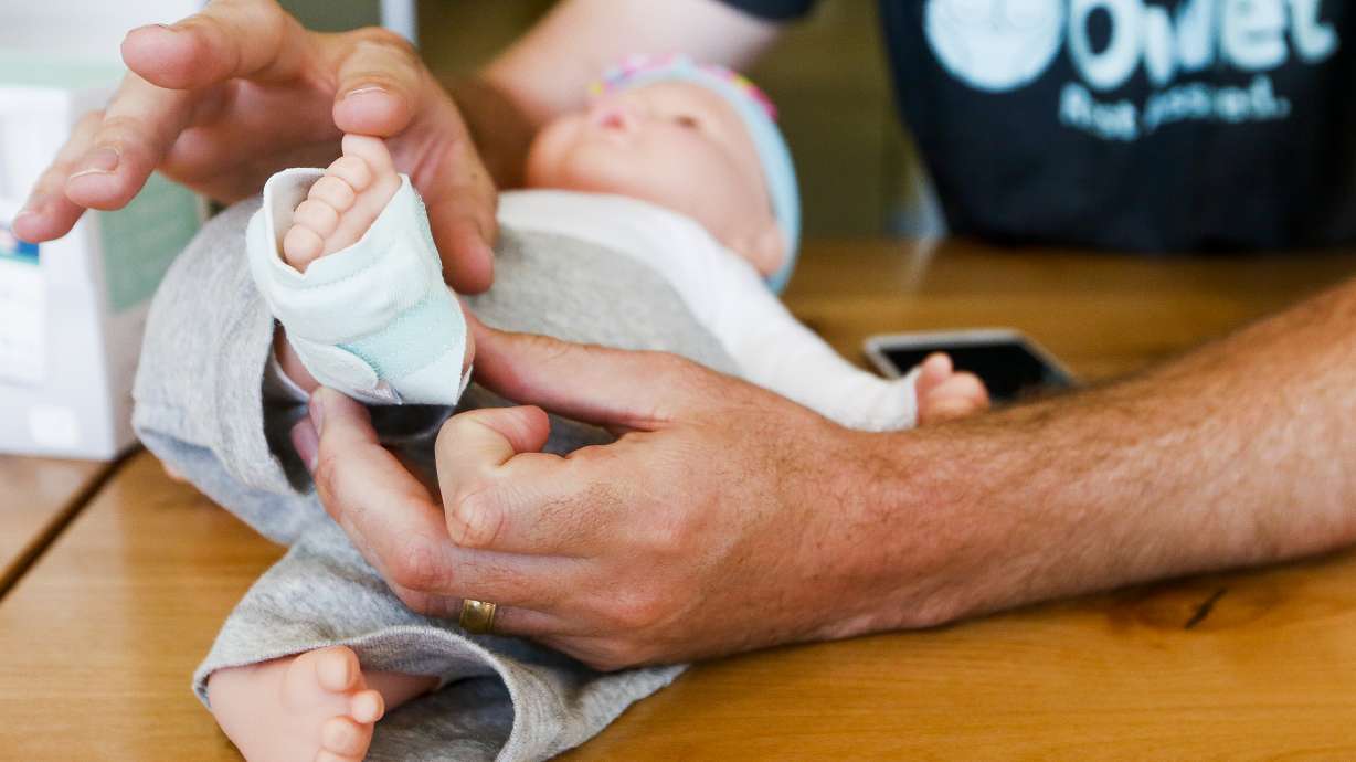 Owlet co-founder Kurt Workman shows off the Smart Sock 2 at the Owlet headquarters in Lehi on May 1, 2017. Owlet has stopped selling its popular baby monitoring socks after receiving a warning from the Food and Drug Administration that it needs to receive approval to be marketed for medical purposes, prompting outcry from some parents.