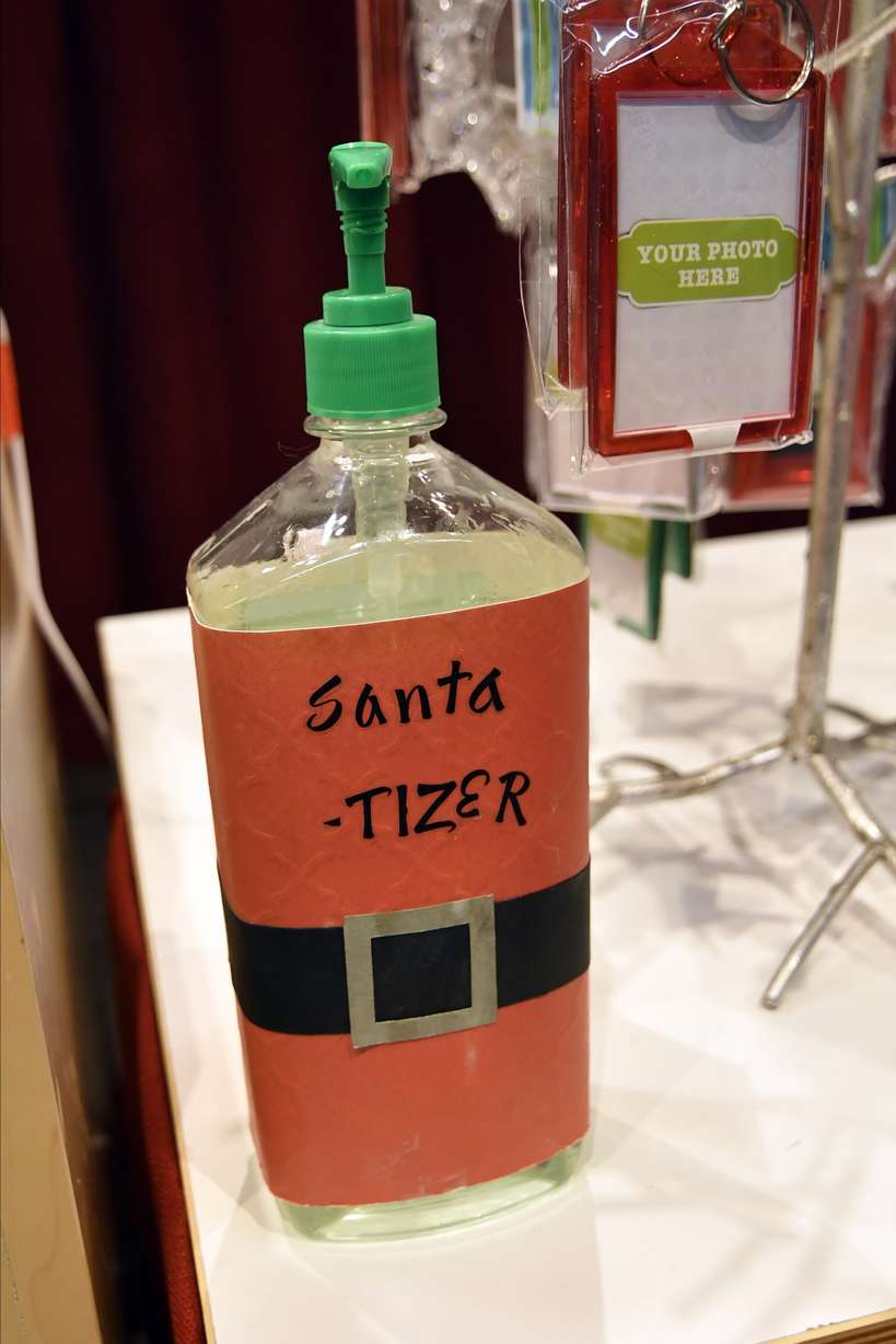 A new spin name on sanitizer sits on a counter, Nov. 15, at The Santa Experience the Mall of America in Bloomington, Minnesota.