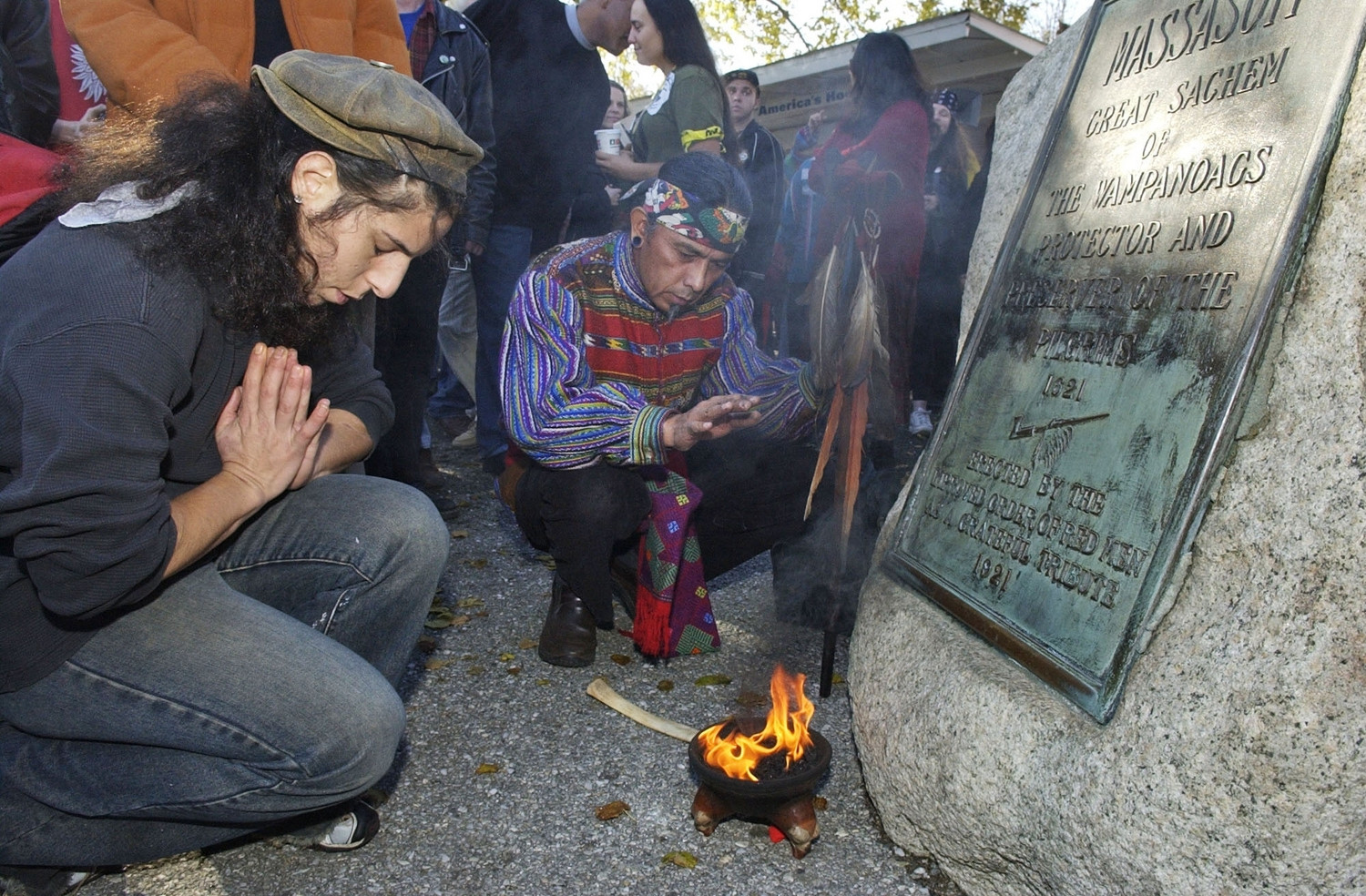Supporters of Native Americans pause following a prayer during the 38th National Day of Mourning at Coles Hill in Plymouth, Mass., on Nov. 22, 2007.
