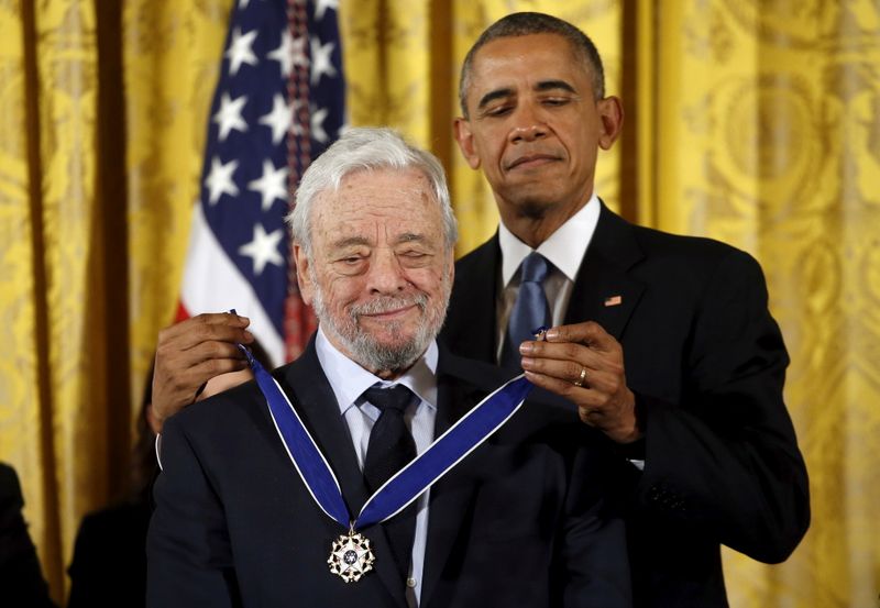 U.S. President Barack Obama presents the Presidential Medal of Freedom to composer and lyricists Stephen Sondheim during an event in the East Room of the White House in Washington Nov. 24, 2015.