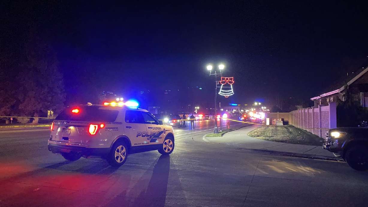 Police close part of 10400 South in South Jordan Friday.