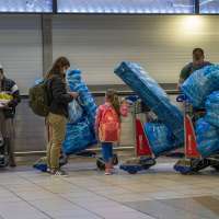 COVID variant spreads to more countries as world on alert